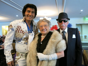 Best costume winners Virginia DeBoer and Naz Rondinelli pose for a photo with Elvis