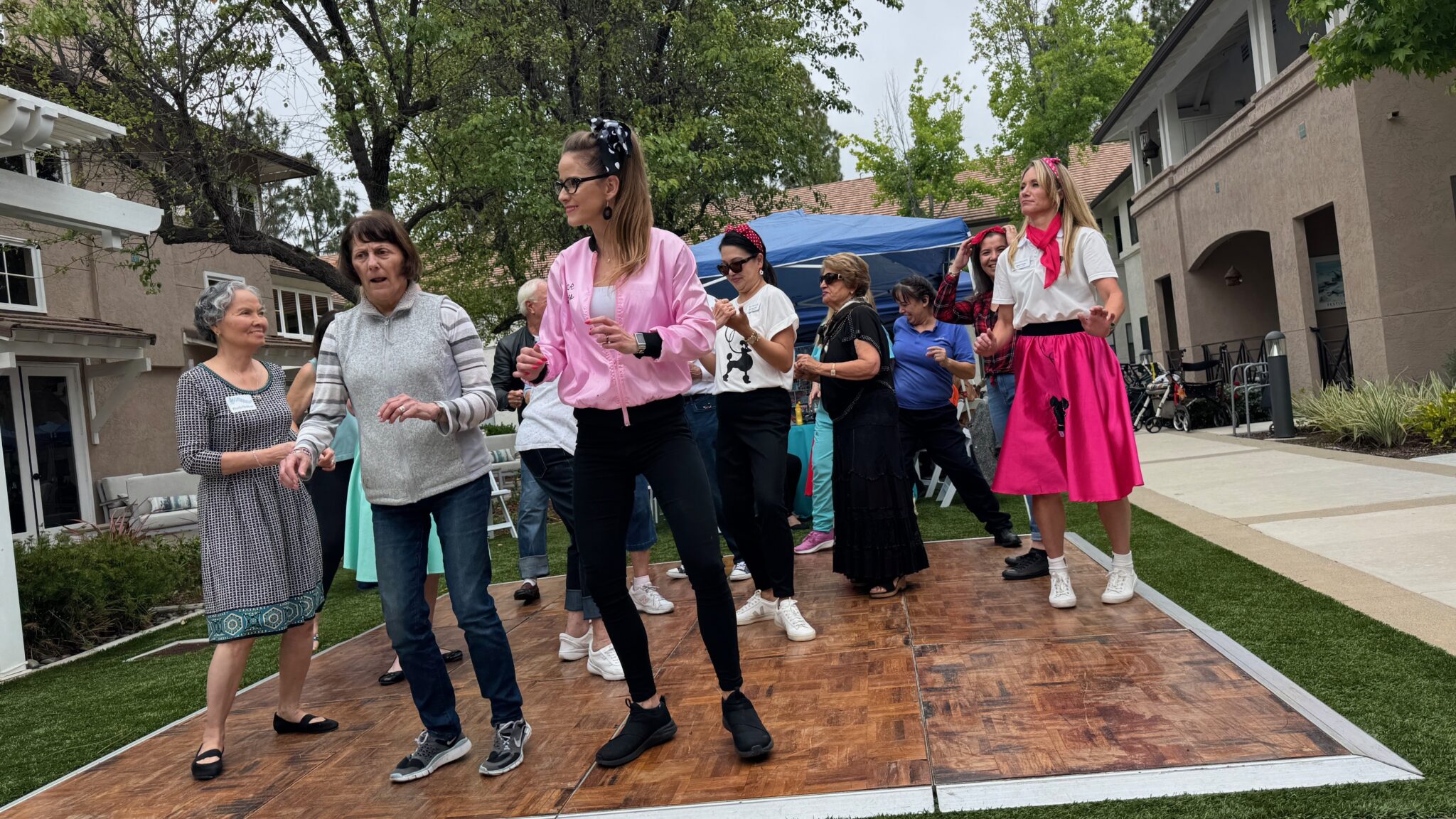 Residents, guests, staff dance the afternoon away